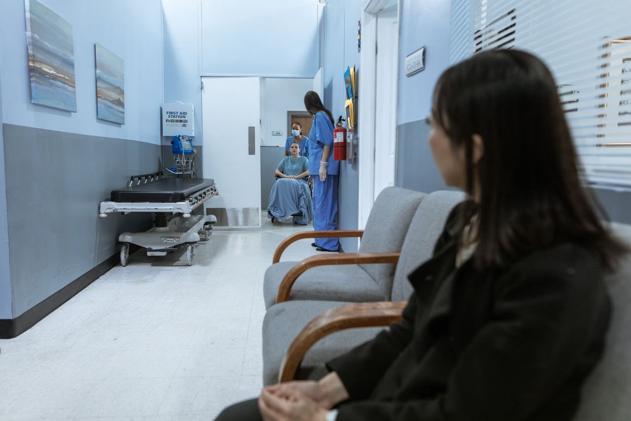Crafting Captivating Headlines: Your awesome post title goes here A hospital scene showing patients and medical staff in a corridor, illustrating healthcare environments.